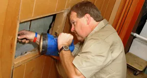 Exterminator looking for parasites